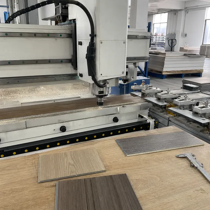 CNC profile milling station for click-lock SPC flooring at Elefloor engineering facility