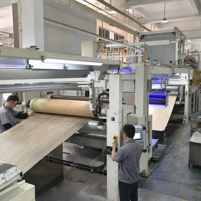 LVT flooring production — décor layer printing and UV coating on calender line