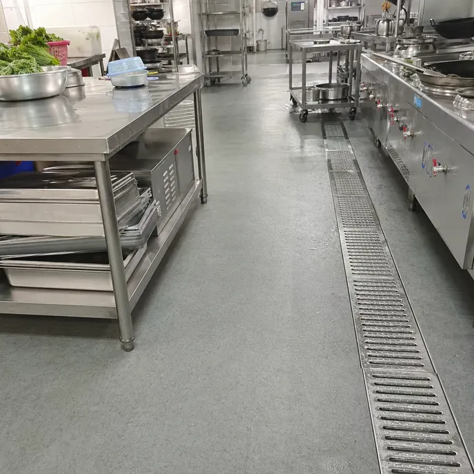 Commercial kitchen flooring with R11 slip-rated LVT in a food service environment