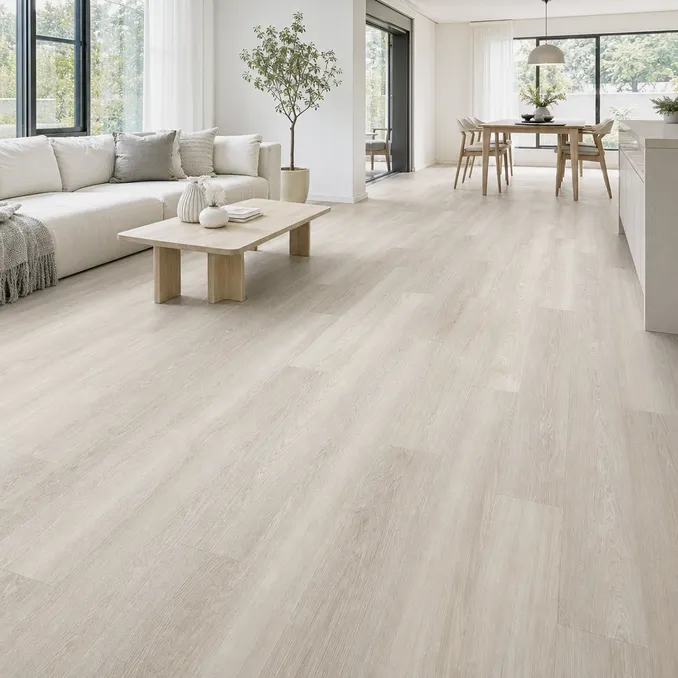 Light LVT flooring in whitewashed oak and natural ash tones showing bright, open-plan interior aesthetic