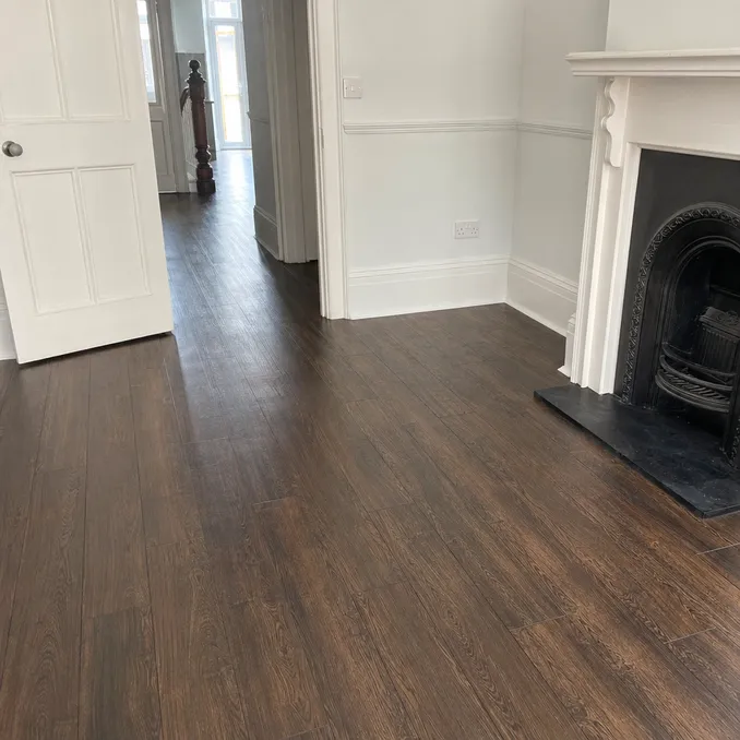 Victorian LVT flooring in dark walnut with narrow plank format referencing period property heritage aesthetics