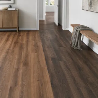 Walnut LVT flooring in natural warm-brown and dark formal tones with pronounced grain contrast