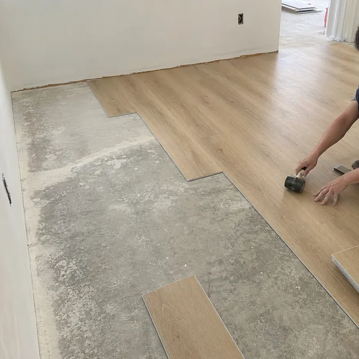 8mm SPC flooring installed over an existing subfloor during a renovation project