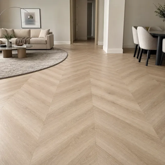 Chevron SPC flooring pattern installed showing angled plank ends meeting at a point