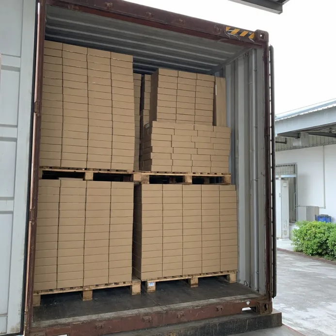 40HQ container loaded with herringbone SPC flooring cartons — efficient stacking due to shorter plank format