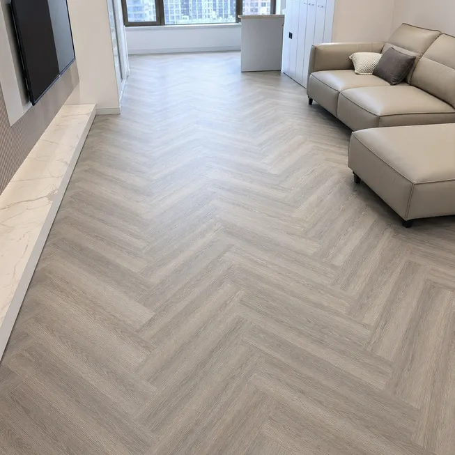Classic herringbone SPC flooring pattern installed