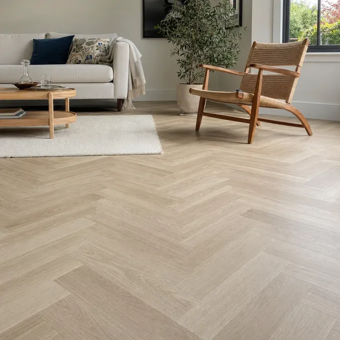 Herringbone SPC flooring installed in a residential living room renovation