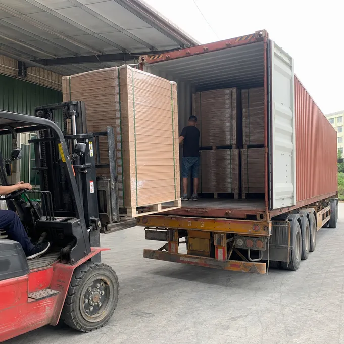 SPC flooring palletized and loaded into shipping container at Elefloor factory