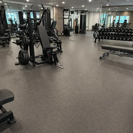 Commercial gym SPC flooring with enhanced indentation resistance and slip-rated surface