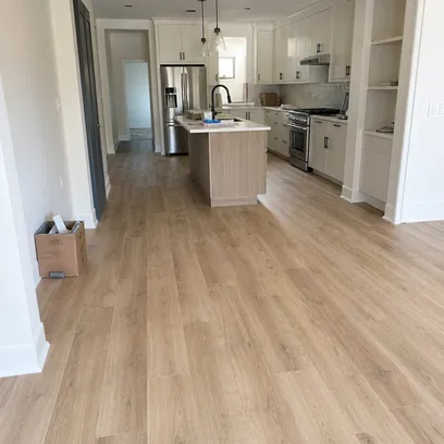 Residential kitchen renovation with wood-look SPC flooring