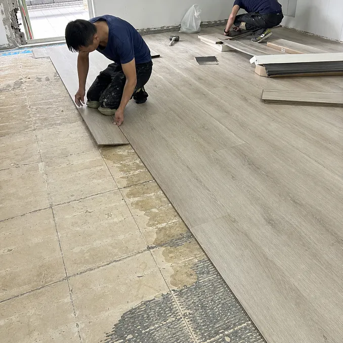 Waterproof SPC flooring installed over existing subfloor during renovation — no extensive prep required
