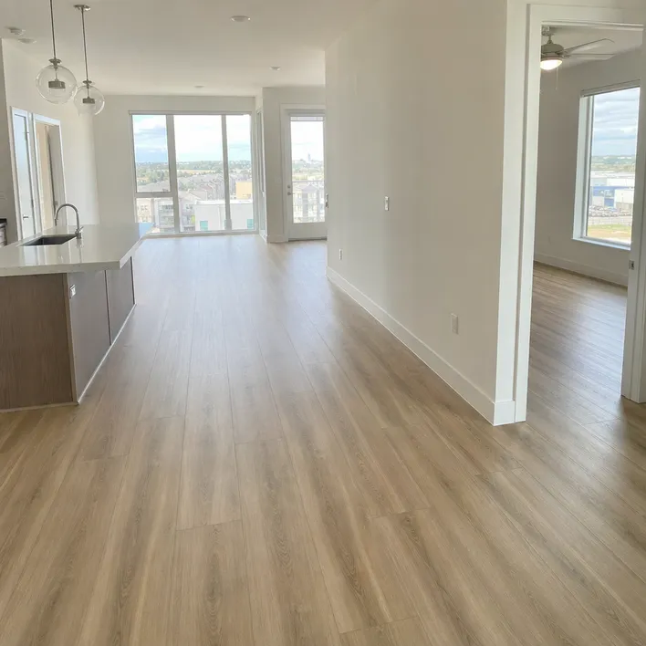 Premium multi-family apartment development with hardwood SPC flooring across multiple units