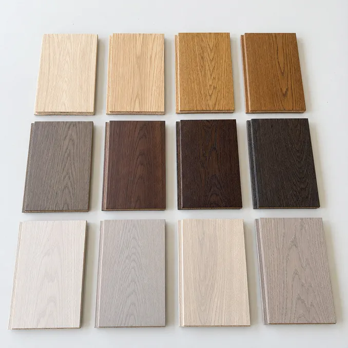 VSPC flooring sample planks showing oak, walnut, and ash species with natural and smoked finishes